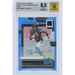 New York Jets Trading Cards^Garrett Wilson Autographed 2022 Panini Clearly Donruss Blue Variation #56 #15/99 BGS Authenticated 8.5/10 Rookie Card